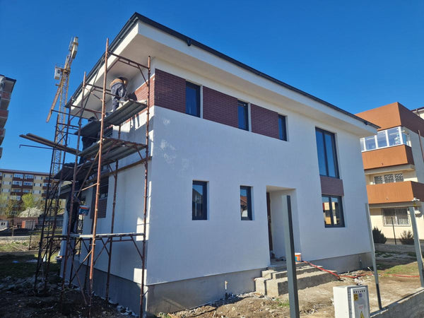 Aplicare placari decorative din caramida aparenta casa metalica