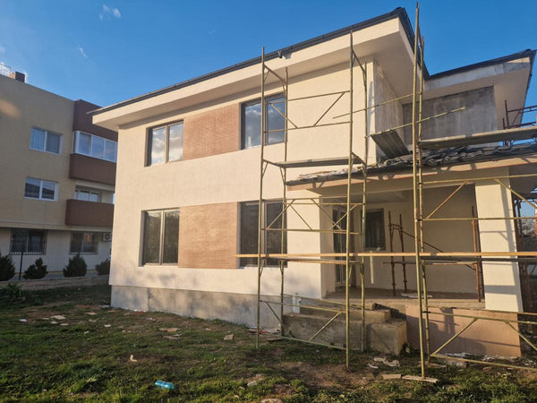 Aplicare placari decorative din caramida aparenta casa metalica