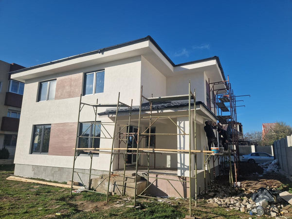 Aplicare placari decorative din caramida aparenta casa metalica