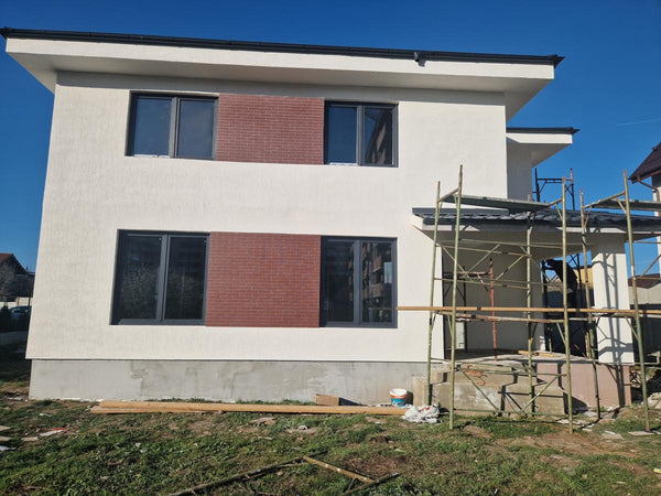 Aplicare placari decorative din caramida aparenta casa metalica