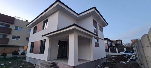 Finalizare fatade constructie casa metalica cu etaj si placari decorative