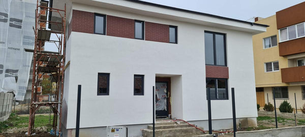 Finalizare fatade constructie casa metalica cu etaj si placari decorative