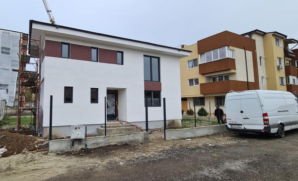 Finalizare fatade constructie casa metalica cu etaj si placari decorative
