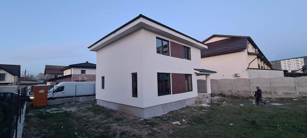 Finalizare fatade constructie casa metalica cu etaj si placari decorative