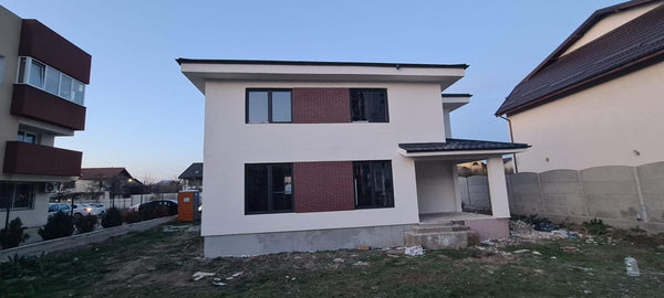 Finalizare fatade constructie casa metalica cu etaj si placari decorative