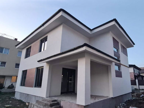 Finalizare fatade constructie casa metalica cu etaj si placari decorative