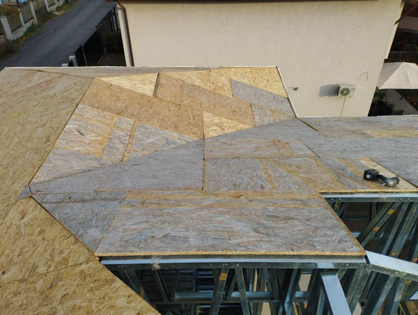 Placari exterioare pereti cu fibrociment si acoperis cu osb casa cu etaj