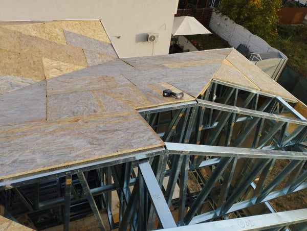 Placari exterioare pereti cu fibrociment si acoperis cu osb casa cu etaj