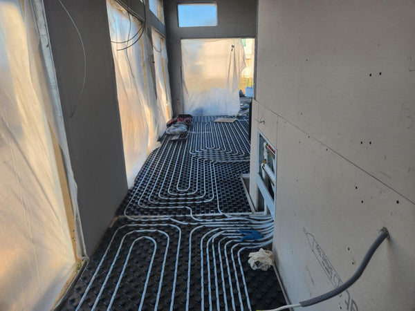 Incalzire in pardoseala si turnare sapa constructie casa parter