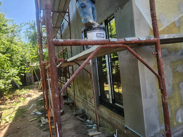 Montaj termosistem vata bazaltica si masa de spaclu casa cu etaj