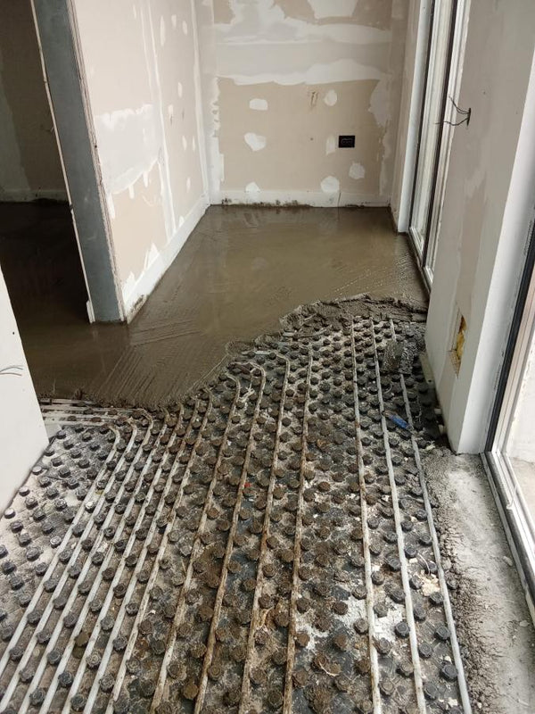 Incalzire in pardoseala si turnare sapa constructie casa parter