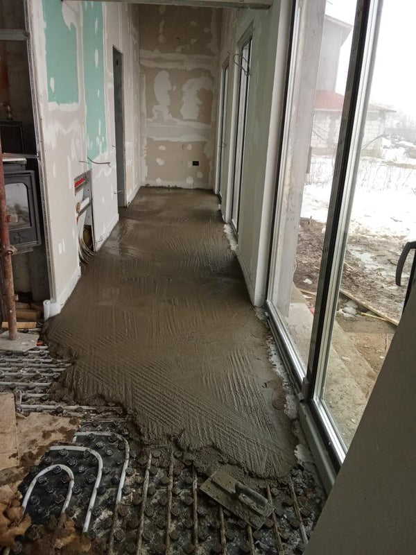 Incalzire in pardoseala si turnare sapa constructie casa parter