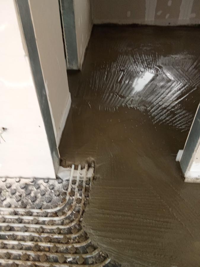 Incalzire in pardoseala si turnare sapa constructie casa parter