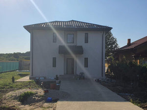 Casa pe structura metalica finisare fatade cu tencuiala decorativa de exterior thumbnail