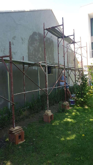 Aplicare strat amorsa fatada pentru proiect casa metalica Craiova thumbnail
