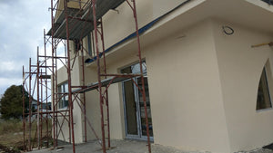 Aplicare tencuiala decorativa siliconata constructie casa Saftica thumbnail