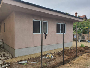 Aplicare adeziv si masa de spaclu casa structura metalica parter thumbnail