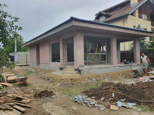 Aplicare adeziv si masa de spaclu casa structura metalica parter thumbnail