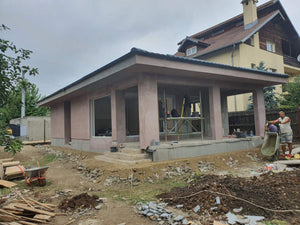 Aplicare adeziv si masa de spaclu casa structura metalica parter thumbnail