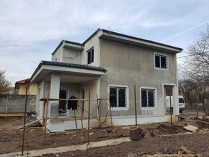 Aplicare masa de spaclu in 2 straturi pe fatade casa metalica thumbnail
