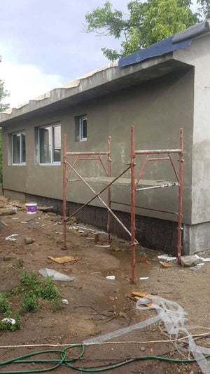 Aplicare masa de spaclu fatada proiect casa metalica in Craiova thumbnail