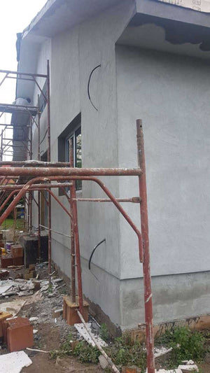 Aplicare masa de spaclu fatada proiect casa metalica in Craiova thumbnail