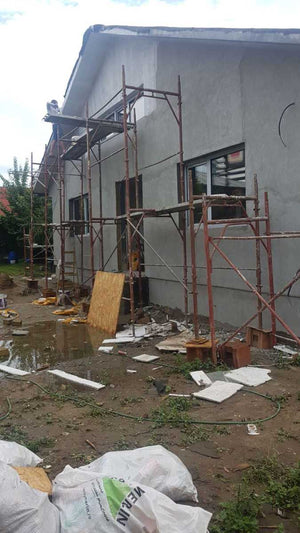 Aplicare masa de spaclu fatada proiect casa metalica in Craiova thumbnail