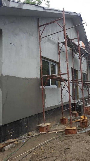 Aplicare masa de spaclu fatada proiect casa metalica in Craiova thumbnail
