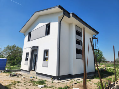 Aplicare tencuiala decorativa casa pe structura metalica fata laterala dreapta