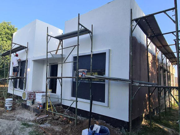 Aplicare tencuiala decorativa siliconata pe fatada casa metalica parter in Snagov