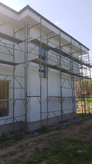 Constructie casa 155 mp aplicare strat amorsa pe fatade thumbnail
