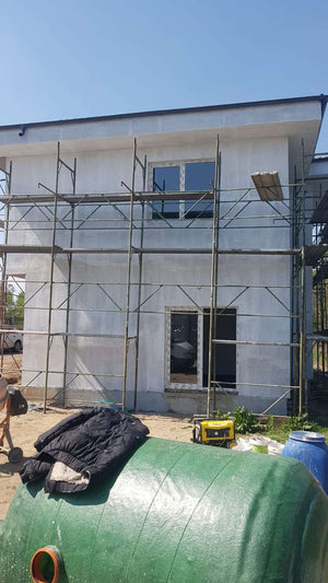 Constructie casa 155 mp aplicare strat amorsa pe fatade thumbnail