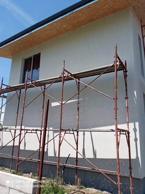 Constructie casa fatade finalizate cu tencuiala decorativa de exterior thumbnail
