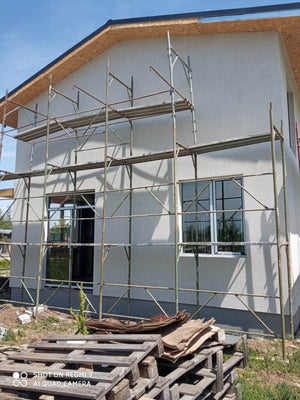 Constructie casa fatade finalizate cu tencuiala decorativa de exterior thumbnail