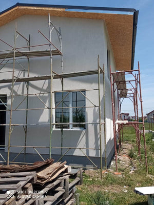 Constructie casa fatade finalizate cu tencuiala decorativa de exterior thumbnail