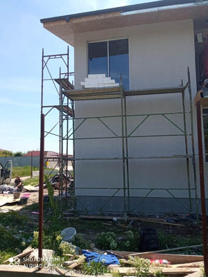 Constructie casa fatade finalizate cu tencuiala decorativa de exterior thumbnail