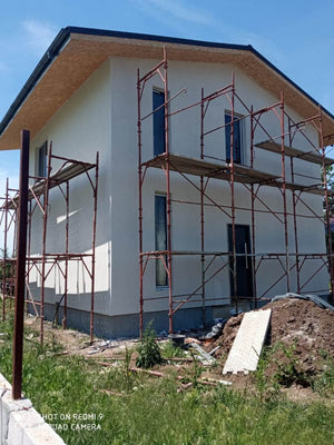 Constructie casa fatade finalizate cu tencuiala decorativa de exterior thumbnail