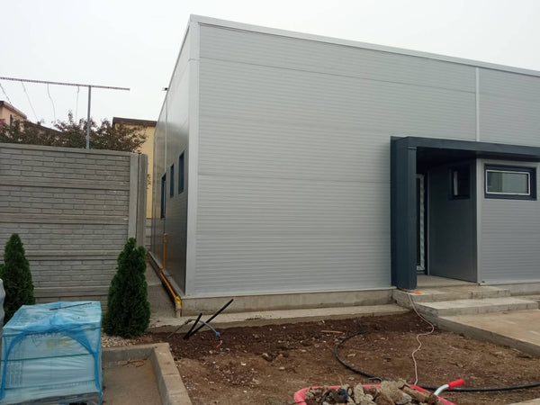 Executie trotuar de garda perimetral din beton in jurul halei