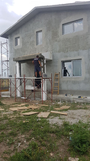 Masa de spaclu fatada proiect casa metalica in Domnesti thumbnail