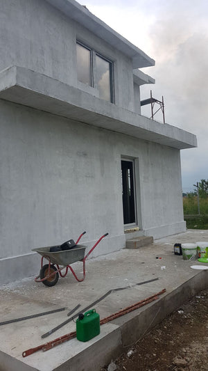 Masa de spaclu fatada proiect casa metalica in Domnesti thumbnail