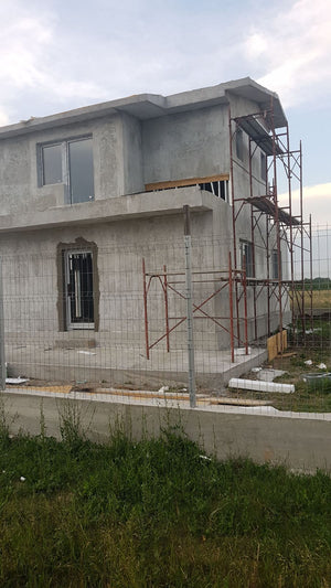 Masa de spaclu fatada proiect casa metalica in Domnesti thumbnail
