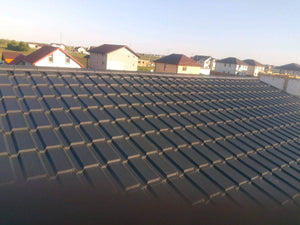 Montaj invelitoare din tigla metalica pe acoperis casa construita in Berceni thumbnail