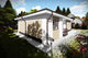 Proiect casa pe structura metalica moderna cu 3 camere 110mp - fatada de casa alba imagine 2