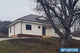 Proiect casa pe structura metalica parter cu 3 camere 160 mp - fatada de casa alba imagine 4