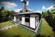 Proiect casa pe structura metalica moderna cu mansarda 048 - fatada de casa placata imagine 4