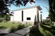 Proiect casa pe structura metalica cu etaj mediteraneana 065 - fatada casa cu piatra imagine 5