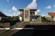 Proiect casa pe structura metalica moderna cu balcoane 052 - fatada de casa cu piatra imagine 4