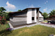 Proiect casa pe structura metalica fara etaj moderna 150 mp - fatada de casa cu piatra imagine 3