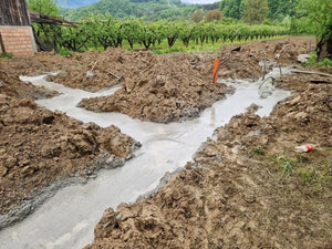 Sapatura mecanizata si turnare beton in talpa fundatie casa metalica 206 mp thumbnail