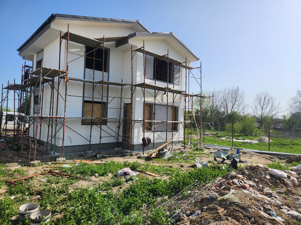 aplicare tencuiala casa metalica 152 mp vedere unghi spate-dreapta